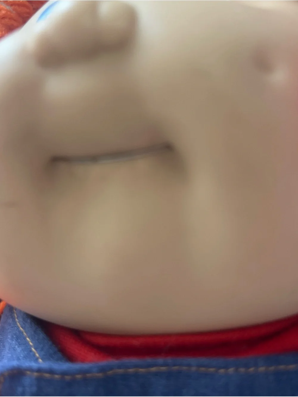 Orange-Haired  Cabbage Patch  Kids Doll with Blue Eyes has tooth retainers